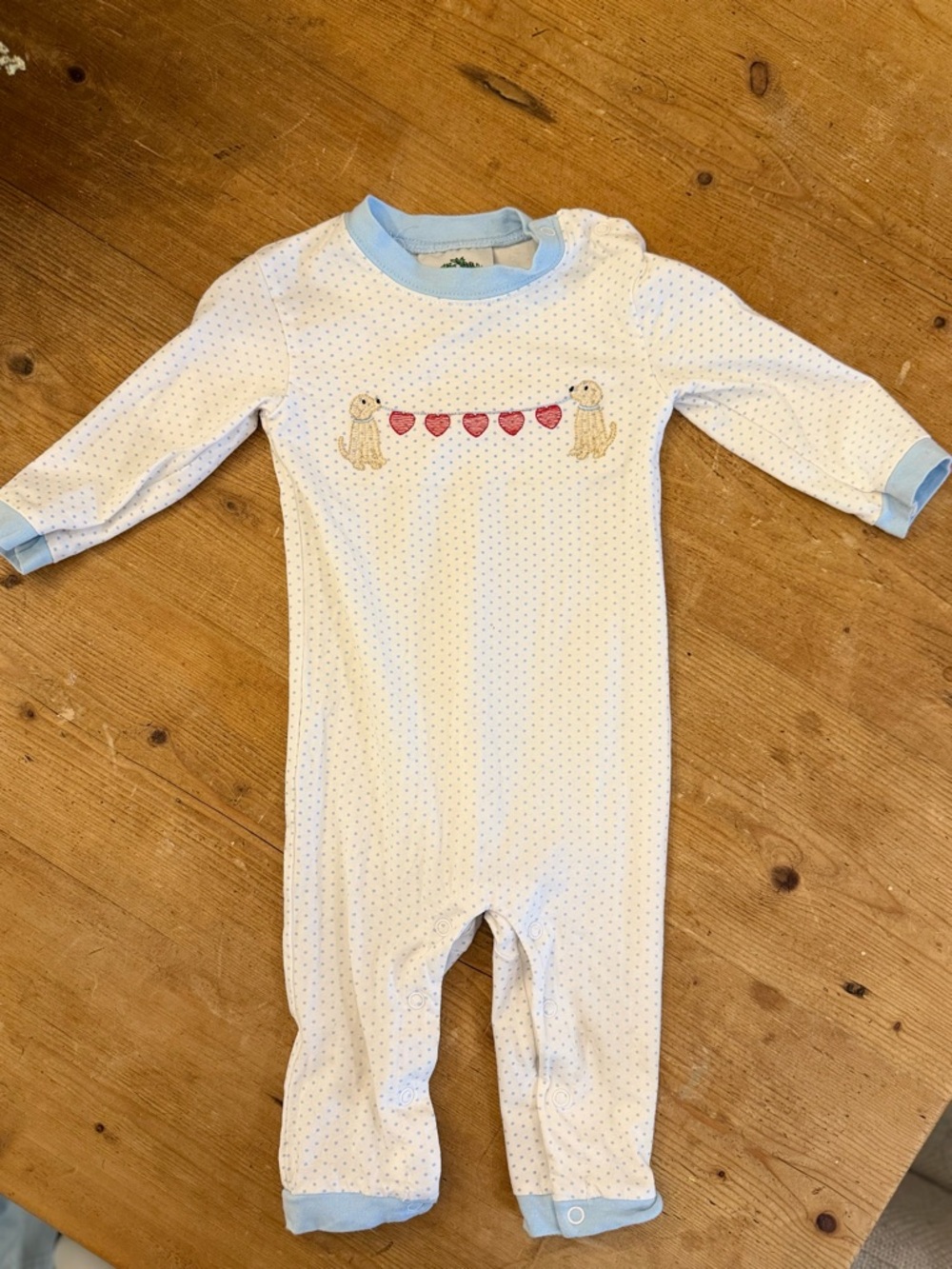 White Baby Footie with Blue Trim and Heart Banner